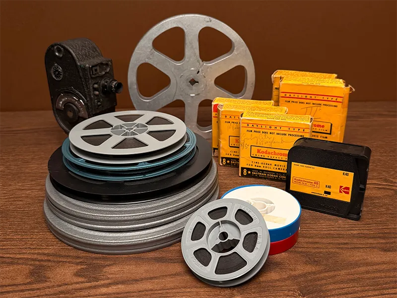 8mm, Super 8 and 16mm movie film reels and vintage film camera for film transfer and digitization