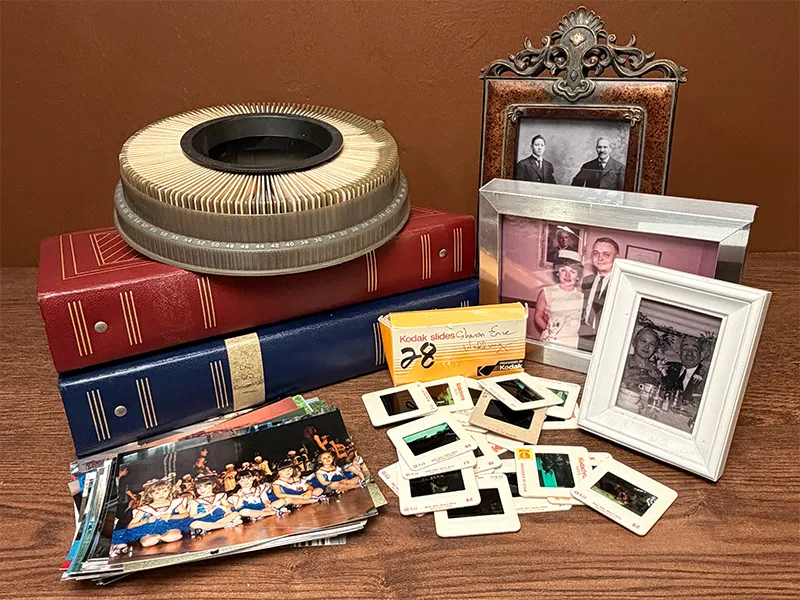 Family photographs, photo albums and 35mm slides for photo scanning and digitization