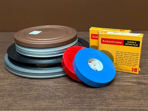 Super 8 film reels, film cans, and Kodachrome film boxes